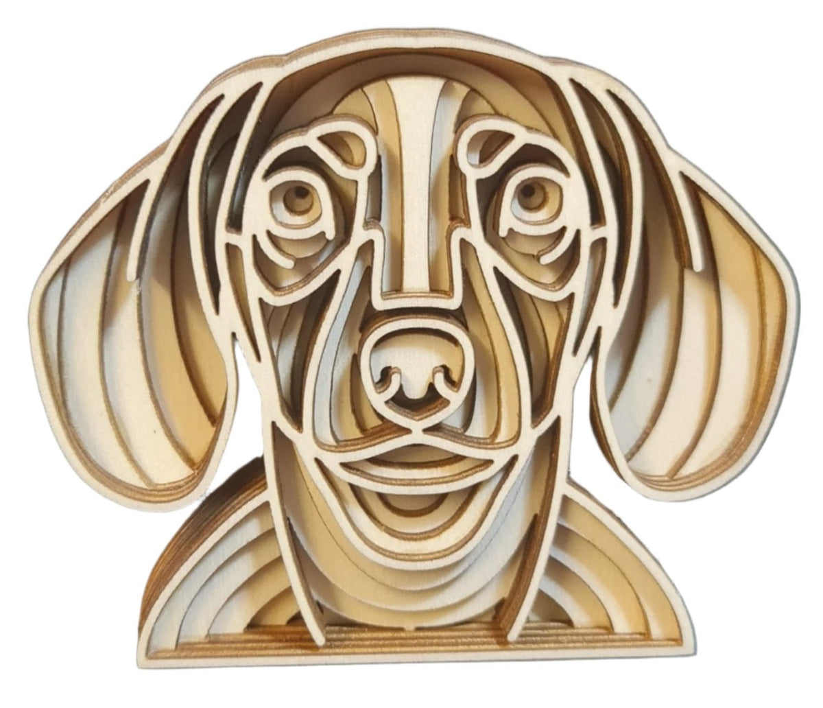 Wooden ornament featuring a dachshund dog head, intricately cut out, showcasing the breed's distinctive features.